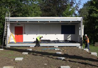 This section of the new classroom is already fitted with power points, a whiteboard and a pinboard