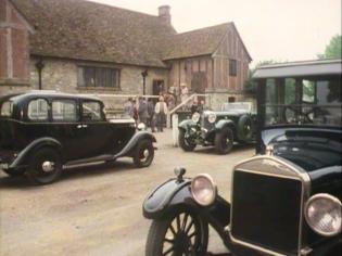Why Didn’t They Ask Evans? Article Photo - The characters leave the Bernard Hall at the end of the inquest